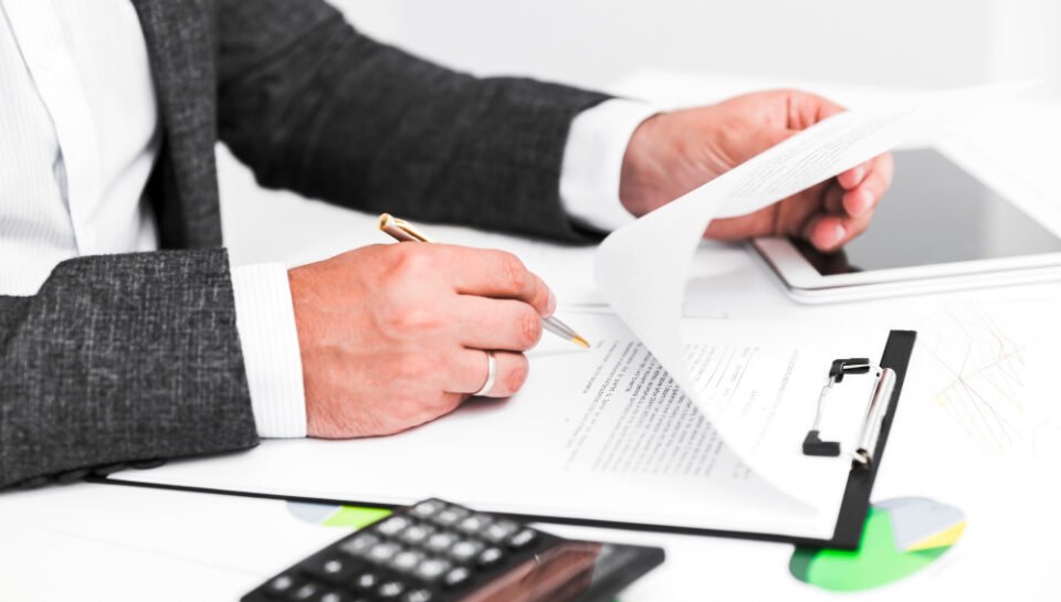 “Business Debt Collection Legal Support – Professional Debt Recovery Attorney in New Jersey” Professional reviewing contract documents, emphasizing effective contract negotiation and legal guidance for business relationships.