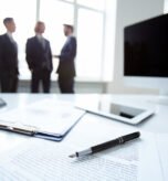 &ldquo;Business attorney in New Jersey providing legal valuation guidance during corporate consultation and document review.&rdquo;