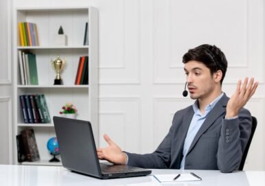 customer-service-cute-guy-grey-suit-with-computer-headset-waving-hands-videocall_140725-164277 customer-service-cute-guy-grey-suit-with-computer-headset-waving-hands-videocall_140725-164277