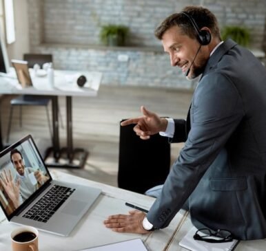 happy-businessman-using-laptop-while-having-online-meeting-with-his-coworker-office_637285-6776 happy-businessman-using-laptop-while-having-online-meeting-with-his-coworker-office_637285-6776