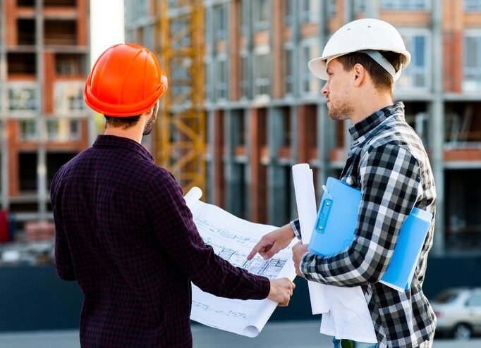 medium-shot-back-view-engineer-architect-supervising-construction_23-2148233788 medium-shot-back-view-engineer-architect-supervising-construction_23-2148233788