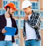 medium-shot-engineer-construction-worker-talking_23-2148233732