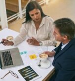people-documents-business-meeting-with-laptop-desk-financial-report-budget-feedback-top-view-employees-tech-with-paperwork-office-investment-solution-review-growth_590464-389857