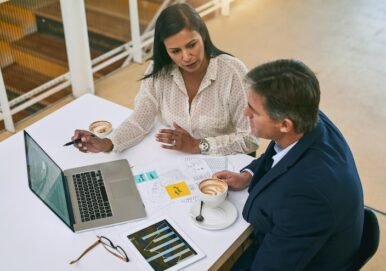 people-documents-business-meeting-with-laptop-desk-financial-report-budget-feedback-top-view-employees-tech-with-paperwork-office-investment-solution-review-growth_590464-389857