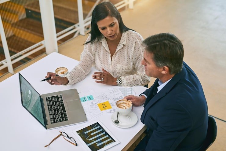 people-documents-business-meeting-with-laptop-desk-financial-report-budget-feedback-top-view-employees-tech-with-paperwork-office-investment-solution-review-growth_590464-389857