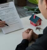 real-estate-brokers-point-contract-paper-advise-customers-sign-their-names-customer-sign_696265-3271