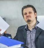 young-businessman-working-from-his-office_181624-28073